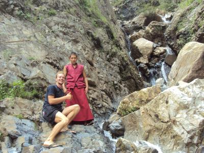 a monk and me washing clothes in the river